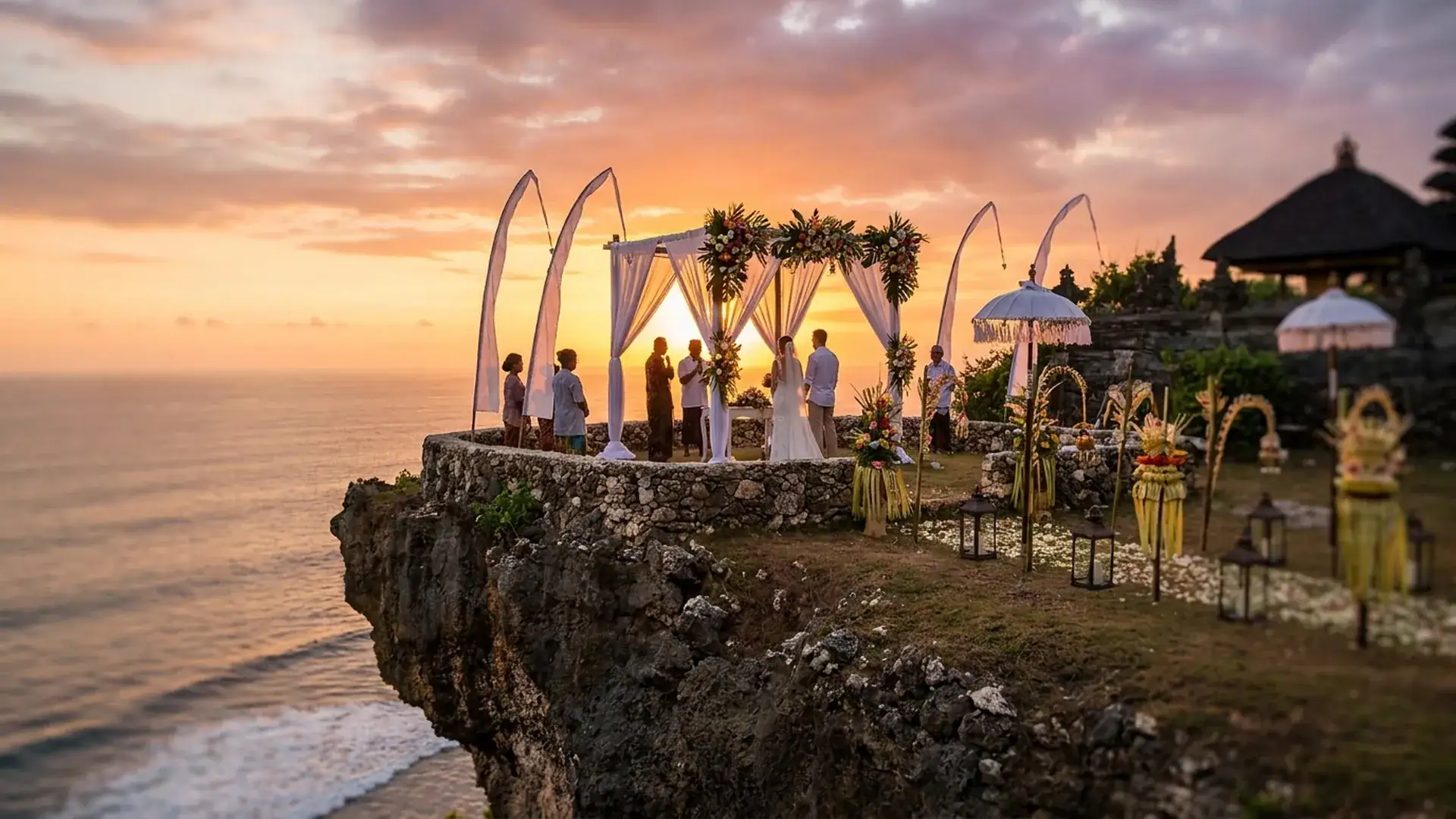Sunset wedding ceremony on Uluwatu cliff, Bali