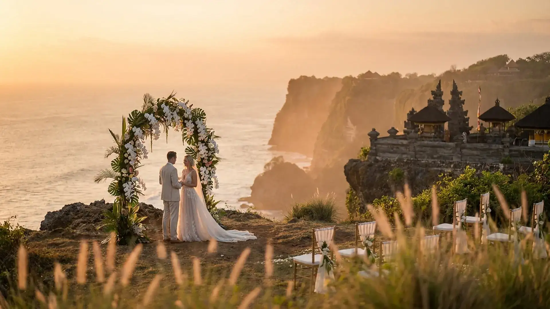 Sunset wedding ceremony on Uluwatu cliff, Bali