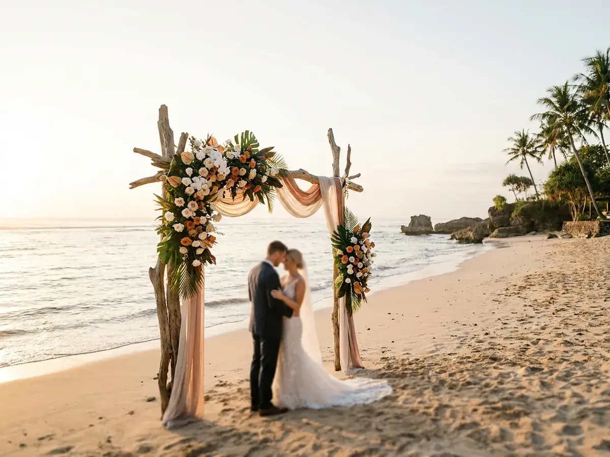 Wedding on a Bali beach — arch with flowers