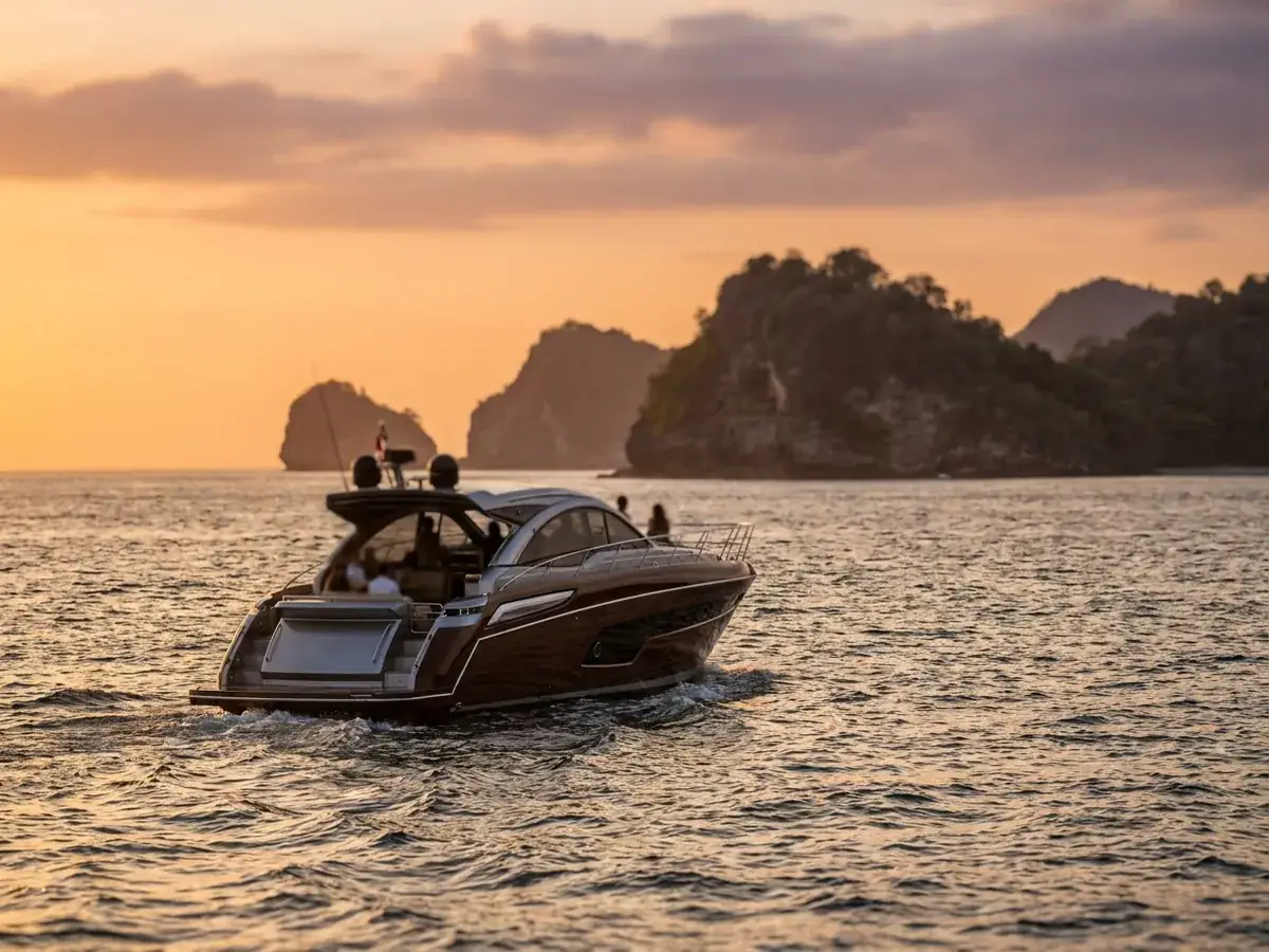 Yacht routes: Nusa Penida, Gili, sunset — captain steering wheel